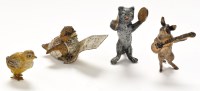 Lot 1209 - Four early 20th Century cold painted animals,...