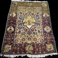 Lot 1218 - A pictorial Kirman rug, the central medallion...