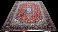 Lot 1222 - A Kashan carpet, the central oval medallion...