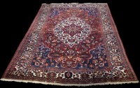 Lot 1223 - A Bakhtiari carpet, with full floral design,...