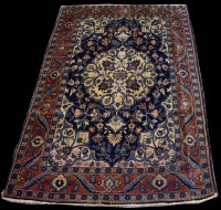 Lot 1227 - A Tabriz rug, the central circular medallion...