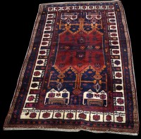 Lot 1240 - A Koliai rug, with geometric design on red and...
