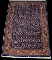 Lot 1252 - A Tabriz rug, with full flowerhead design on...