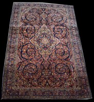 Lot 1254 - A Sarough rug, central floral medallions...