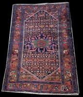Lot 1256 - A Toyserkan rug, with geometric designs and...