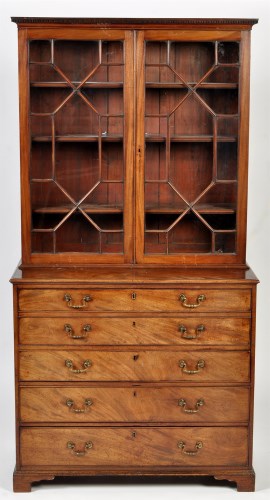 Lot 1293 - A George III mahogany secretaire bookcase, the...