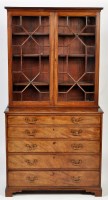 Lot 1293 - A George III mahogany secretaire bookcase, the...