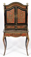Lot 1301 - A Louis XV style ebonised, red boulle work and...
