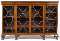 Lot 1311 - A Victorian mahogany breakfront bookcase, the...