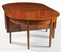 Lot 1312 - A George III mahogany dining table, the...