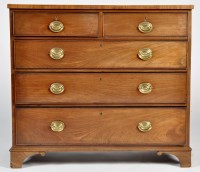 Lot 1317 - A George III mahogany chest of two short and...