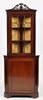 Lot 1319 - An early 20th Century mahogany corner display...