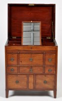 Lot 1324 - A George III mahogany campaign washstand, the...