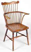 Lot 1338 - An 18th Century comb back chair, attributed to...