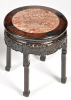 Lot 1340 - An early 20th Century Chinese carved hardwood...