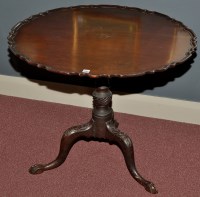 Lot 1352 - A George III style tip-up-top table, the...