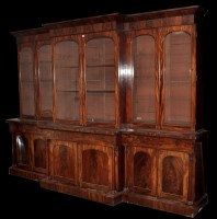 Lot 1361 - A George III mahogany breakfront bookcase, the...