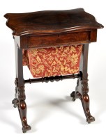 Lot 1375 - A Victorian walnut work table, the shaped...