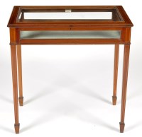 Lot 1379 - An Edwardian inlaid mahogany bijouterie table,...