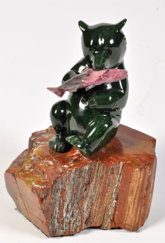 Lot 362 - Lyle Sopel: carved jade petrified wood and...