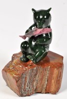 Lot 362A - Lyle Sopel: carved jade petrified wood and...
