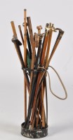 Lot 375 - *A collection of walking sticks and parasols,...