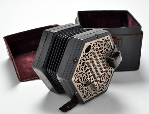 Lot 400 - An early 20th Century hexagonal concertina,...