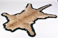 Lot 423 - A taxidermy cheetah skin rug, by Van Ingen &...