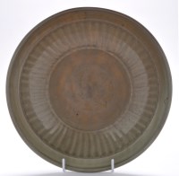 Lot 488 - Large Longquan celadon type fluted dish, the...