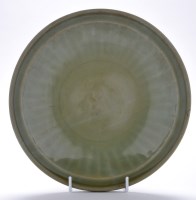 Lot 489 - Large Longquan celadon type fluted dish, the...