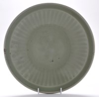 Lot 492 - Large Longquan celadon type fluted dish, the...