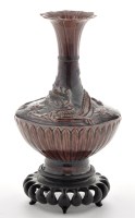 Lot 498 - Aubergine glaze moulded 'dragon' vase, angular...