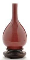 Lot 503 - Speckled red glaze bottle vase, the body with...