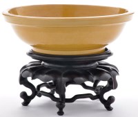 Lot 510 - Monochrome yellow bowl, the concave shaped...