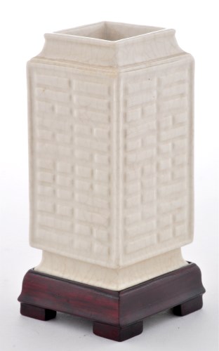 Lot 514 - White glaze square section vase, cong, of Guan-...