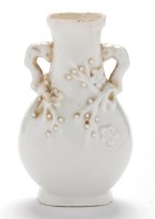 Lot 539 - Blanc-de-chine flattened baluster shaped vase,...