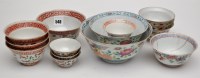 Lot 548 - Four famille rose bowls, largest diameter...