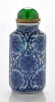 Lot 559 - Blue and white 'Indian lotus' cylindrical...