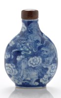 Lot 565 - Blue and white flattened ovoid 'Buddhist lion'...