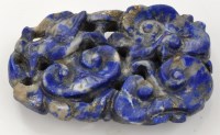 Lot 600 - Lapis flower scroll pendant, reversible with...