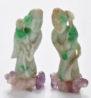 Lot 607 - Pair of jadeite figures, hunched over holding...