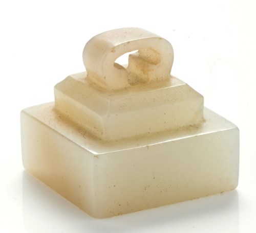 Lot 619 - Pale celadon jade seal, square section body of...