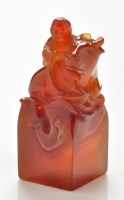 Lot 622 - Agate 'boy and bull' seal, the boy climbing...