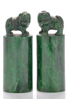 Lot 626 - Pair of malachite ' Buddhist lion' seals, of...