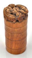 Lot 657 - Carved ivory container and cover, the screw...