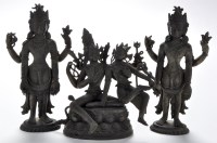 Lot 670 - Three Hindu-Buddhist bronzed metal deities,...