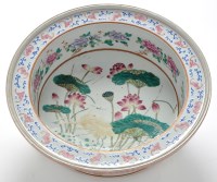 Lot 691 - Chinese Famille Rose circular basin, the...