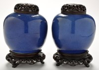 Lot 700 - Two Chinese blue ground jars, of bulbous form,...