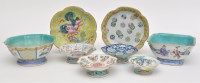 Lot 701 - Two Chinese Famille Rose bowls and six stands,...