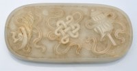 Lot 733 - Chinese celadon jade oval plaque, with three...